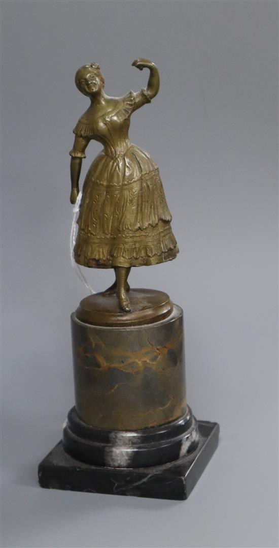 A small bronze of a dancing lady on a marble base H.17.5cm